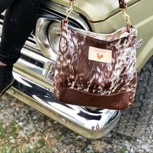 Cowhide convertible book bag . Custom